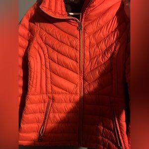 very nice coat just tight on me. nice material